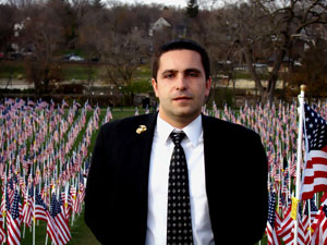 Peter Agapov by the Statue of Liberty in NYC